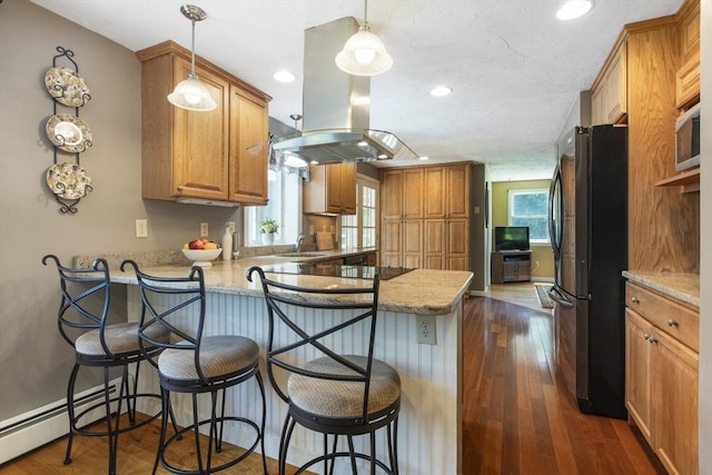 2 Harding Rd, Medway, MA 02053 - kitchen featuring freestanding refrigerator, a peninsula, island exhaust hood, recessed lighting, and a kitchen breakfast bar