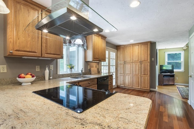 2 Harding Rd, Medway, MA 02053 - kitchen featuring cooktop, wall chimney exhaust hood, dishwasher, brown cabinets, and plenty of natural light