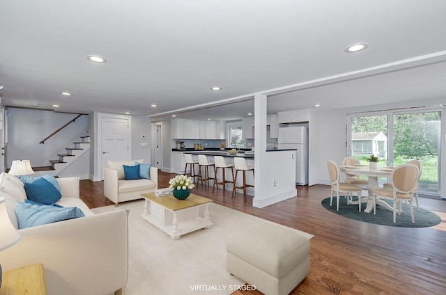 10 Briggs Ln, Marion, MA 02738 - living room featuring stairs, recessed lighting, wood finished floors, and baseboards