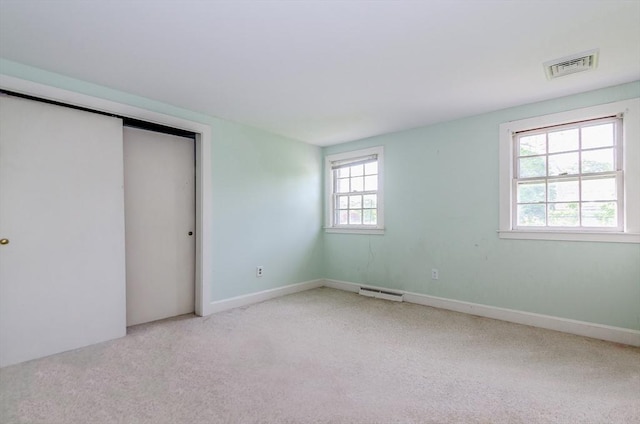 10 Briggs Ln, Marion, MA 02738 - unfurnished bedroom featuring carpet, a closet, and baseboards