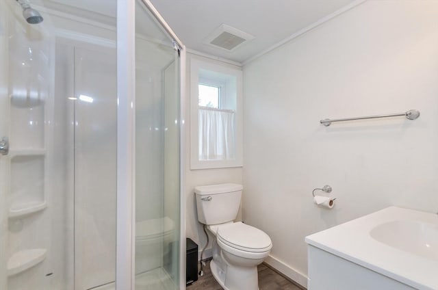 10 Briggs Ln, Marion, MA 02738 - bathroom featuring toilet, a shower stall, wood finished floors, and vanity