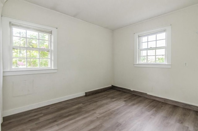 10 Briggs Ln, Marion, MA 02738 - unfurnished room with crown molding, dark wood-style floors, and baseboards