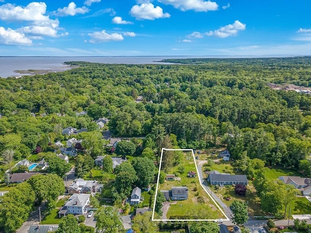 10 Briggs Ln, Marion, MA 02738 - aerial overview of property's location with a forest, property boundaries highlighted, and a nearby body of water