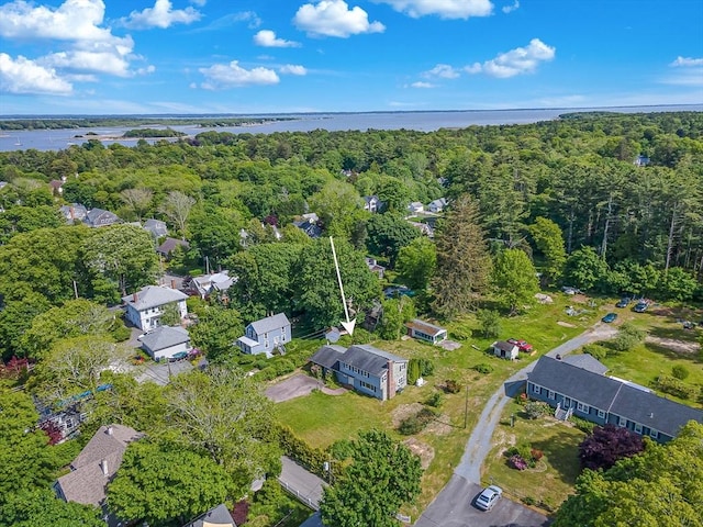 10 Briggs Ln, Marion, MA 02738 - view of property location with a large body of water, a heavily wooded area, and a notable bridge