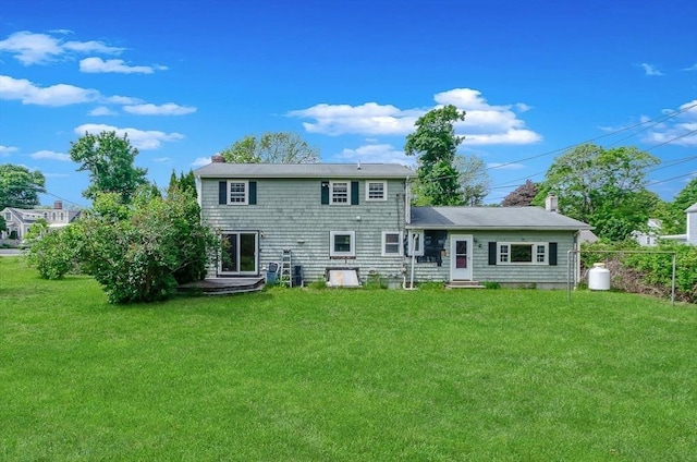 10 Briggs Ln, Marion, MA 02738 - back of property with a chimney, a lawn, and entry steps
