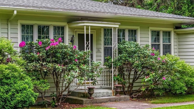 16 Stoneledge Rd, Dartmouth, MA 02748 - property entrance featuring a shingled roof