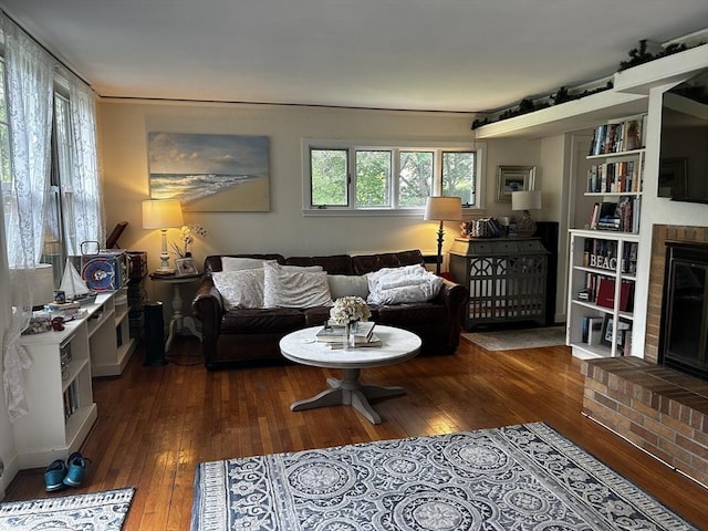 16 Stoneledge Rd, Dartmouth, MA 02748 - living room featuring a brick fireplace and hardwood / wood-style flooring