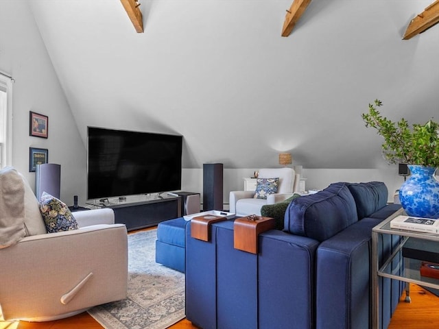 living area featuring light wood-type flooring and lofted ceiling