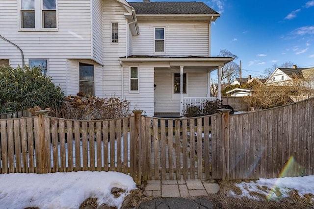 front of property featuring covered porch