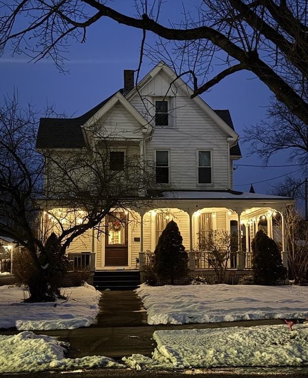 view of front of home featuring covered porch