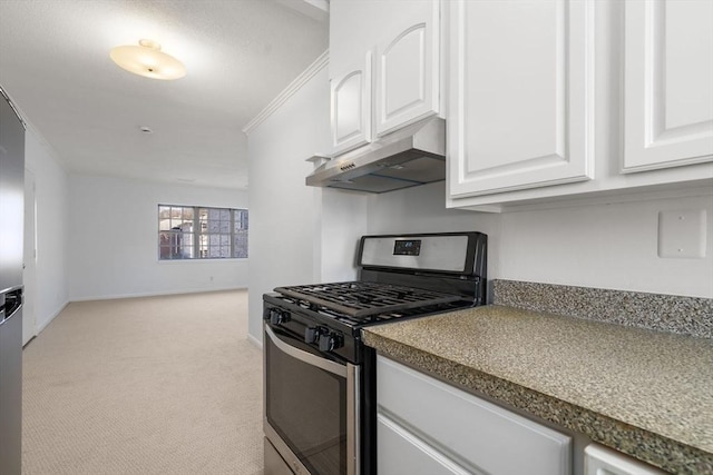 kitchen featuring light colored carpet, under cabinet range hood, white cabinets, gas stove, and crown molding