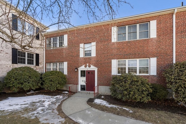 multi unit property featuring brick siding