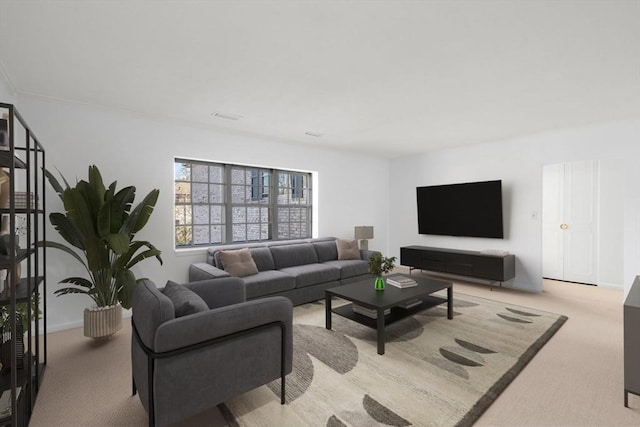 living area with carpet and visible vents