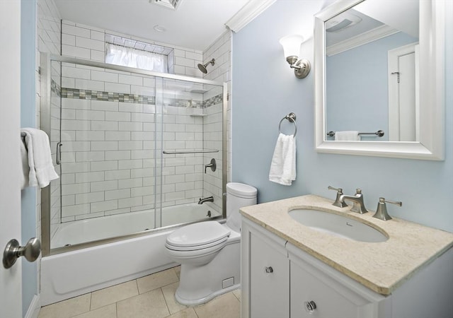 full bathroom with toilet, crown molding, tile patterned floors, bath / shower combo with glass door, and vanity