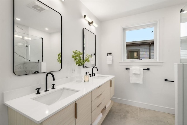 31 Evergreen St Unit 2, Boston, MA 02130 - full bath with double vanity, a marble finish shower, and tile patterned floors