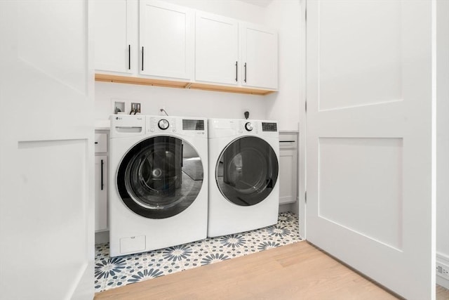 31 Evergreen St Unit 2, Boston, MA 02130 - laundry room with cabinet space and washer and clothes dryer
