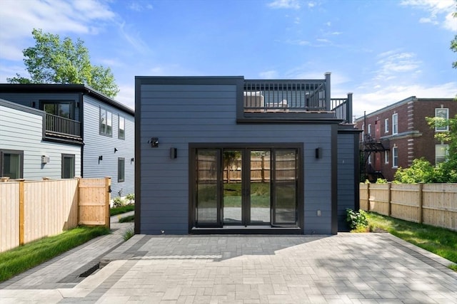 31 Evergreen St Unit 2, Boston, MA 02130 - back of house with a balcony and a patio area