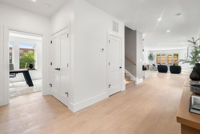31 Evergreen St Unit 2, Boston, MA 02130 - hall featuring light wood-style floors, plenty of natural light, stairway, and recessed lighting