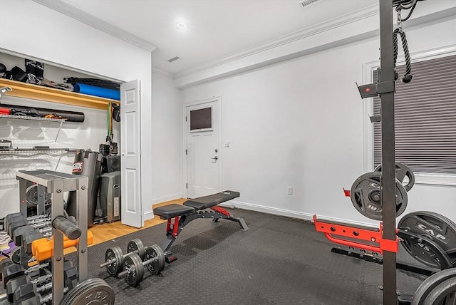 3 Lowell St Unit 1, Waltham, MA 02453 - exercise room featuring ornamental molding and baseboards