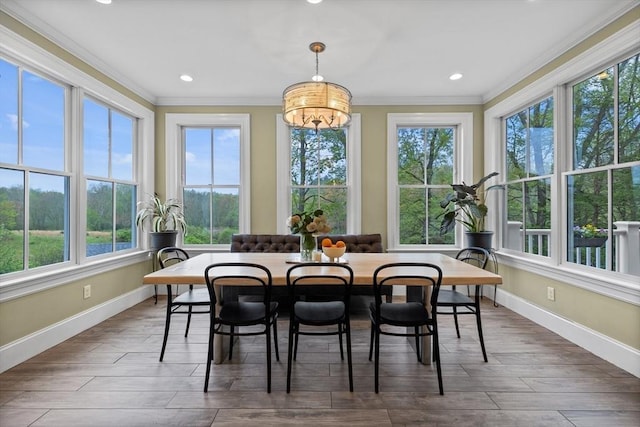 14 Reiling Pond Rd, Lincoln, MA 01773 - dining space with crown molding, wood finished floors, a chandelier, and recessed lighting