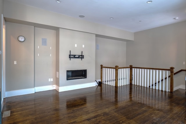 living room with dark wood-type flooring