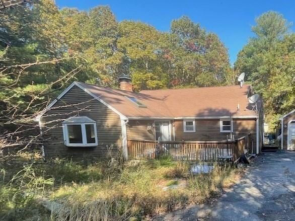 48 Grove, Plympton, MA 02367 - ranch-style home featuring a deck and a chimney