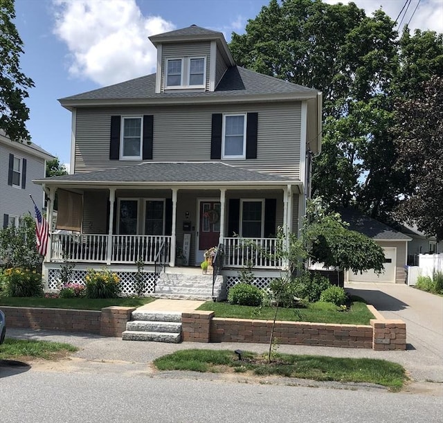 14 Highland St, Clinton, MA 01510 - traditional style home featuring a porch, driveway, and a shingled roof