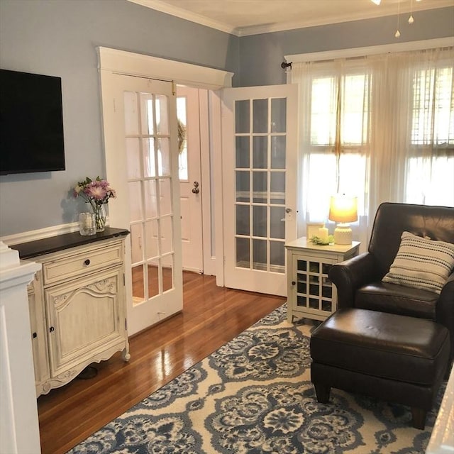 14 Highland St, Clinton, MA 01510 - sitting room with ornamental molding and dark wood-type flooring