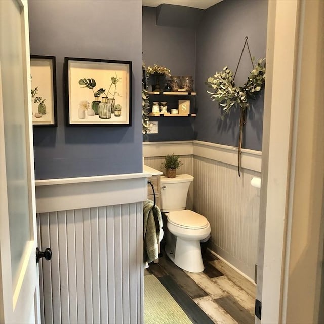 14 Highland St, Clinton, MA 01510 - bathroom with wood finished floors and a wainscoted wall