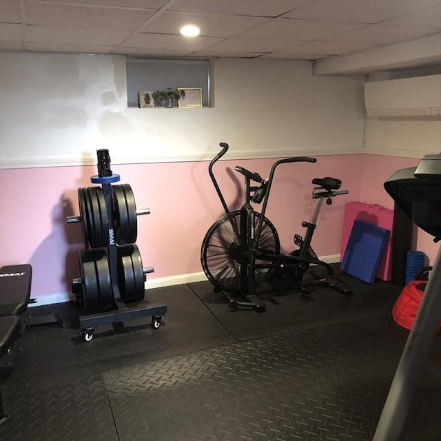 14 Highland St, Clinton, MA 01510 - exercise room with a drop ceiling and a wall mounted air conditioner