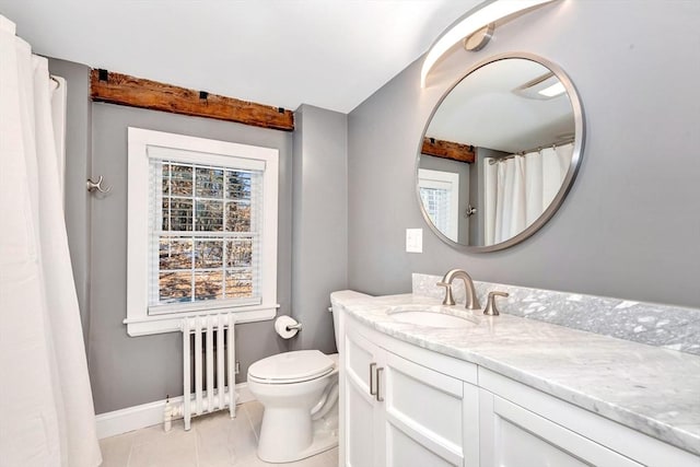 full bath with tile patterned flooring, toilet, vanity, baseboards, and radiator heating unit