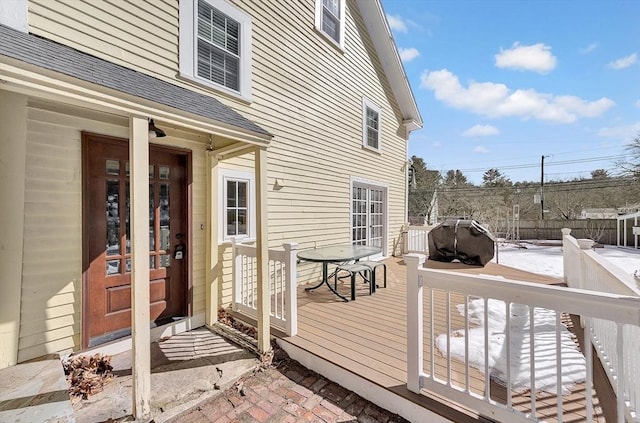 wooden terrace featuring fence and area for grilling