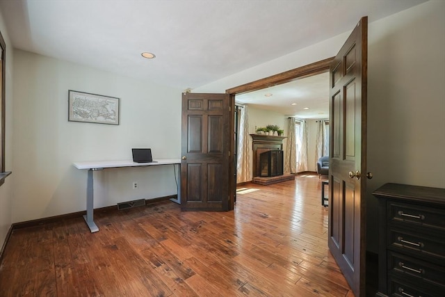 5 Windsor Rd, Lynnfield, MA 01940 - office space featuring a fireplace with raised hearth, hardwood / wood-style floors, and recessed lighting
