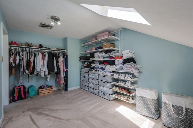5 Windsor Rd, Lynnfield, MA 01940 - spacious closet with a skylight, carpet floors, and vaulted ceiling