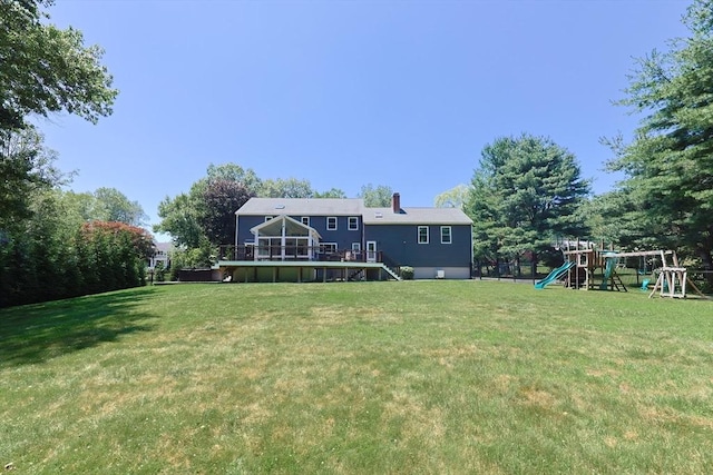 5 Windsor Rd, Lynnfield, MA 01940 - back of house featuring a playground, a deck, a lawn, and stairs