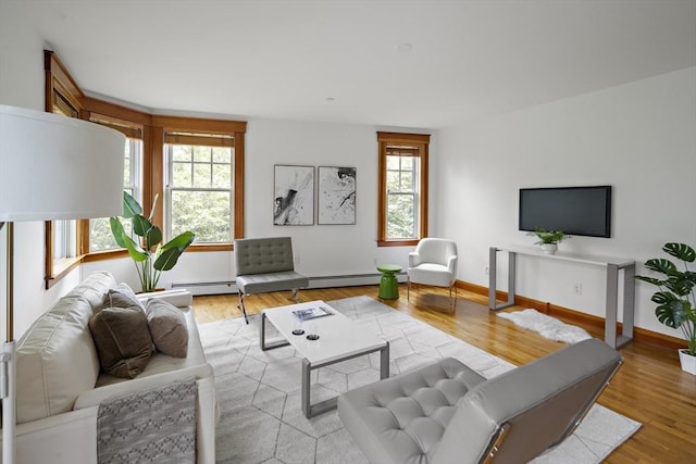 432 Norfolk St Unit 3B, Somerville, MA 02143 - living room featuring baseboard heating and wood finished floors