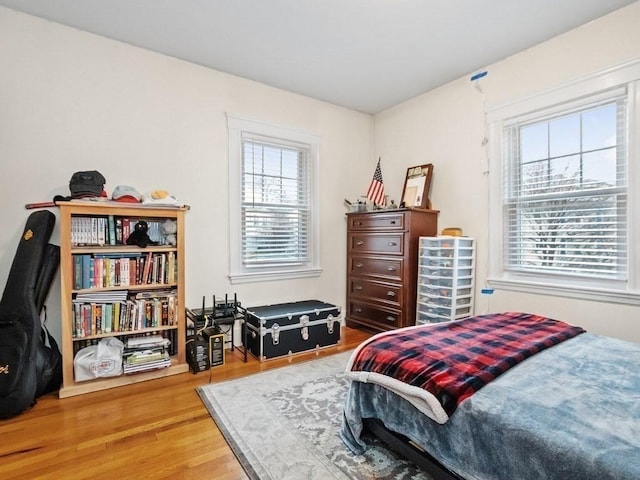 bedroom featuring hardwood / wood-style floors