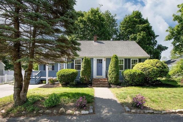 12 Beverly Cir, Randolph, MA 02368 - view of front of home with a chimney and a shingled roof