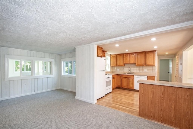 12 Beverly Cir, Randolph, MA 02368 - kitchen featuring white appliances, a sink, light countertops, healthy amount of natural light, and a textured ceiling