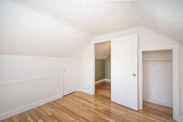 12 Beverly Cir, Randolph, MA 02368 - bonus room with light wood-style flooring, lofted ceiling, and baseboards