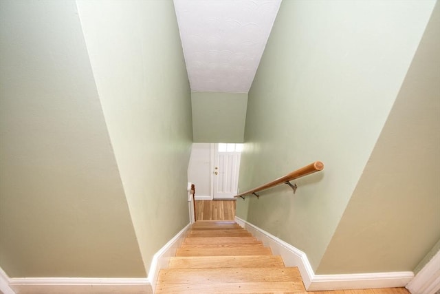 12 Beverly Cir, Randolph, MA 02368 - stairs featuring wood finished floors and baseboards