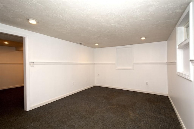 12 Beverly Cir, Randolph, MA 02368 - unfurnished room with dark carpet, recessed lighting, a textured ceiling, and baseboards