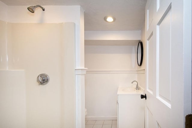 12 Beverly Cir, Randolph, MA 02368 - bathroom featuring vanity, a shower, tile patterned floors, toilet, and baseboards