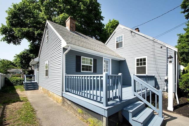 12 Beverly Cir, Randolph, MA 02368 - bungalow-style home with a chimney and a shingled roof