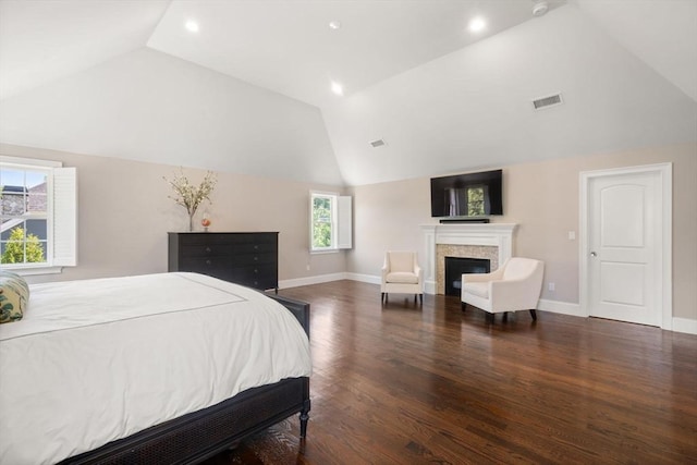 27 Covered Bridge Ln, Wayland, MA 01778 - bedroom with wood finished floors, a fireplace, baseboards, recessed lighting, and high vaulted ceiling