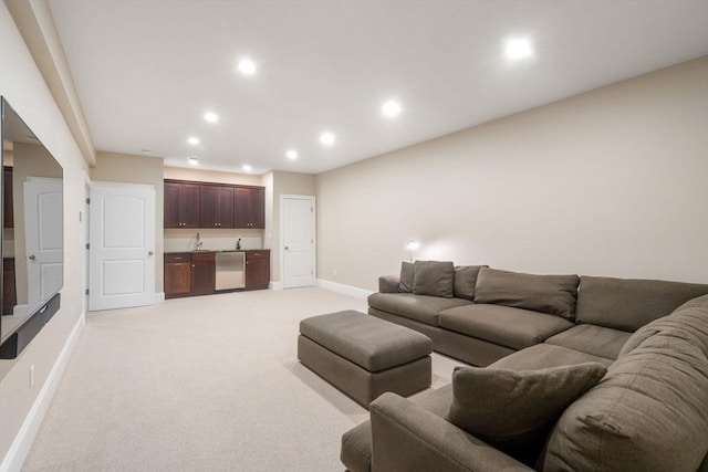 27 Covered Bridge Ln, Wayland, MA 01778 - living area featuring baseboards, bar with sink, recessed lighting, and light colored carpet