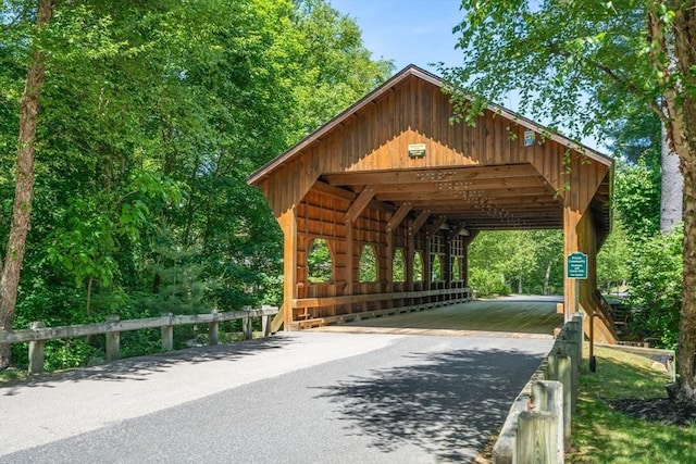 27 Covered Bridge Ln, Wayland, MA 01778 - view of home's community with asphalt driveway and a detached carport