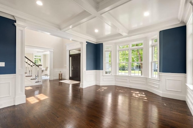 27 Covered Bridge Ln, Wayland, MA 01778 - unfurnished living room with beamed ceiling, ornate columns, stairway, a decorative wall, and coffered ceiling