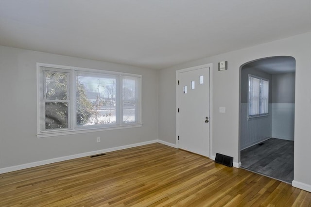 entryway with wood-type flooring