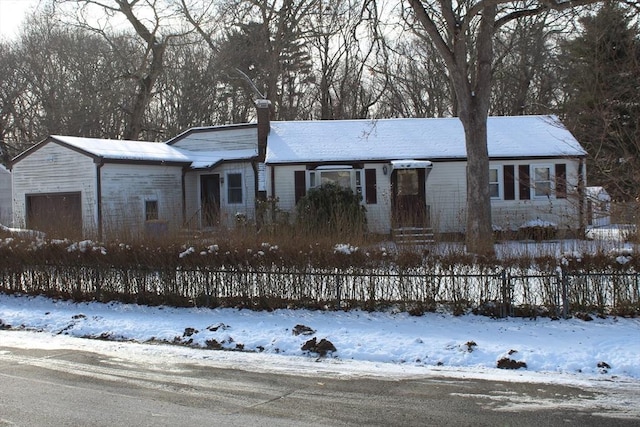 ranch-style home featuring an attached garage